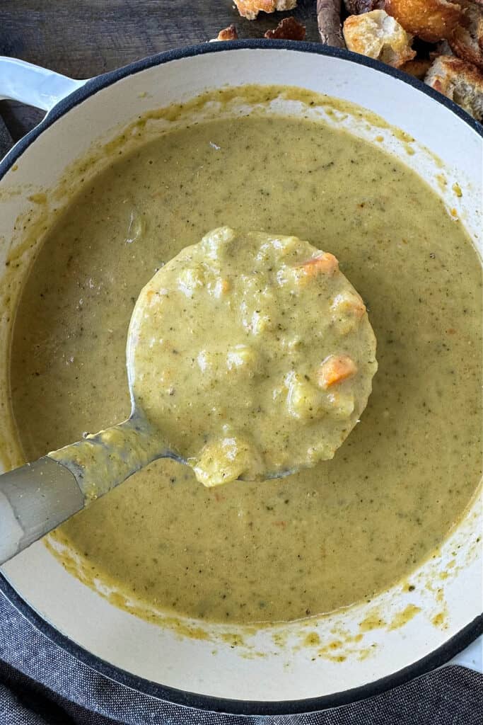 broccoli soup in pot with ladle