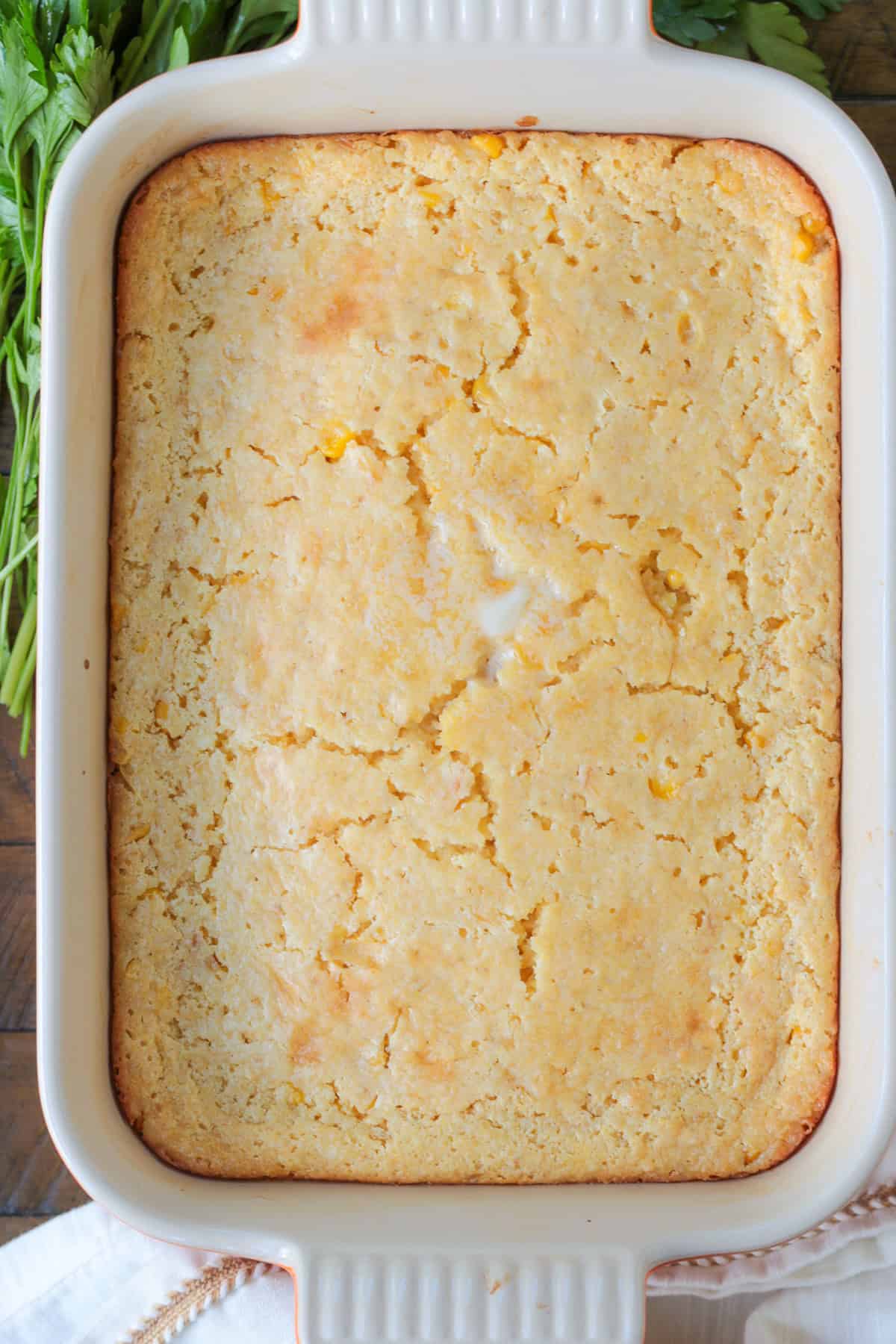 This creamy and sweet Corn Souffle is an delicious side dish for every occasion! Just 5 minutes of prep time and it's ready for the oven! baked corn souffle from the top