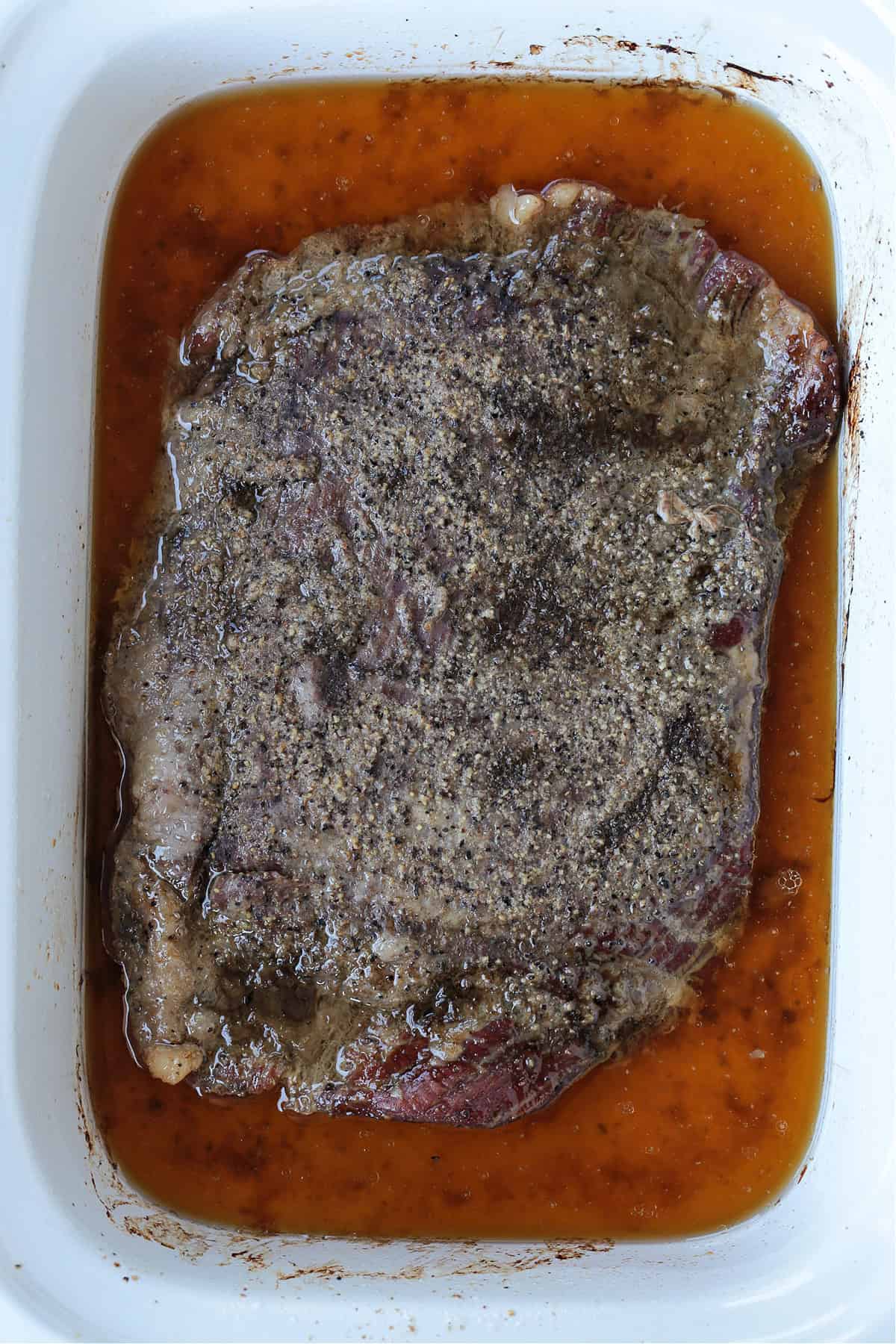 Slow Cooker Flank Steak is so tender and flavorful! When the grill isn't an option, try using a slow cooker to make your steak dinner. cooked steak in slow cooker