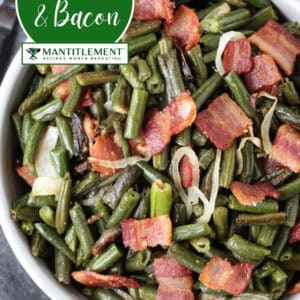 green beans with bacon and onions in a bowl