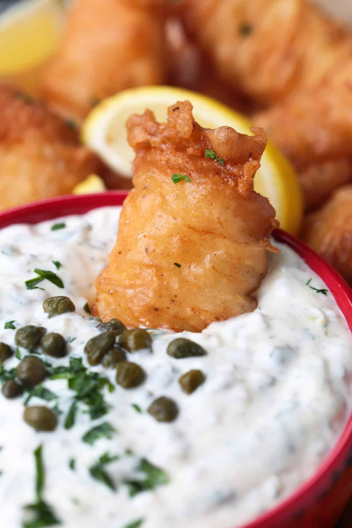 Easy homemade tartar sauce is creamy, tangy, and packed with fresh flavor. Delicious on fish, shrimp, fries, and so munch more! fried fish dipped into tartar sauce
