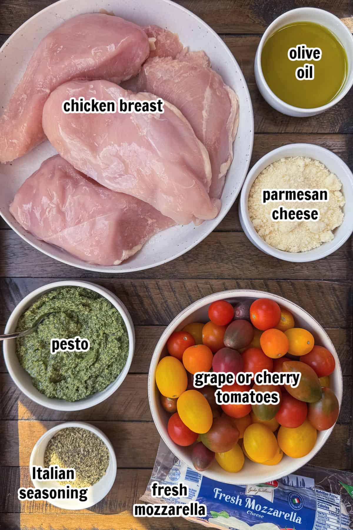 Grilled Chicken Margherita is an easy dinner recipe made with juicy grilled chicken, fresh mozzarella, ripe tomatoes, garlic, and pesto. ingredients for making margherita chicken