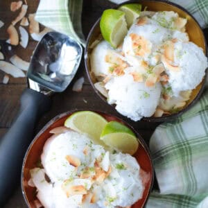 two bowls of coconut sorbet with scooper in background