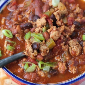 turkey chili in a bowl with a spoon