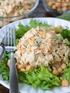 chicken salad with chickpeas on a bed of lettuce