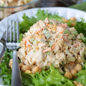 chicken salad with chickpeas on a bed of lettuce