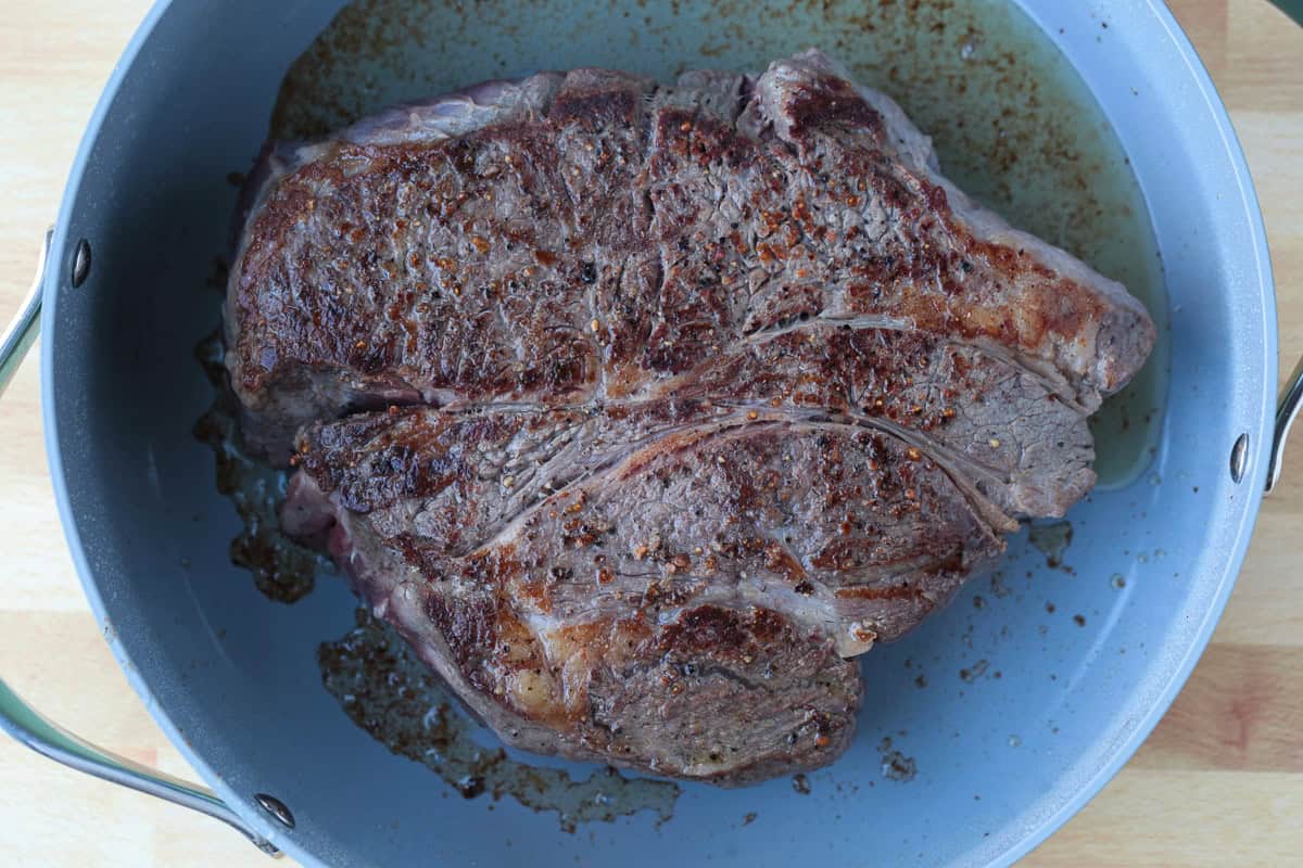 seared chuck roast in pot