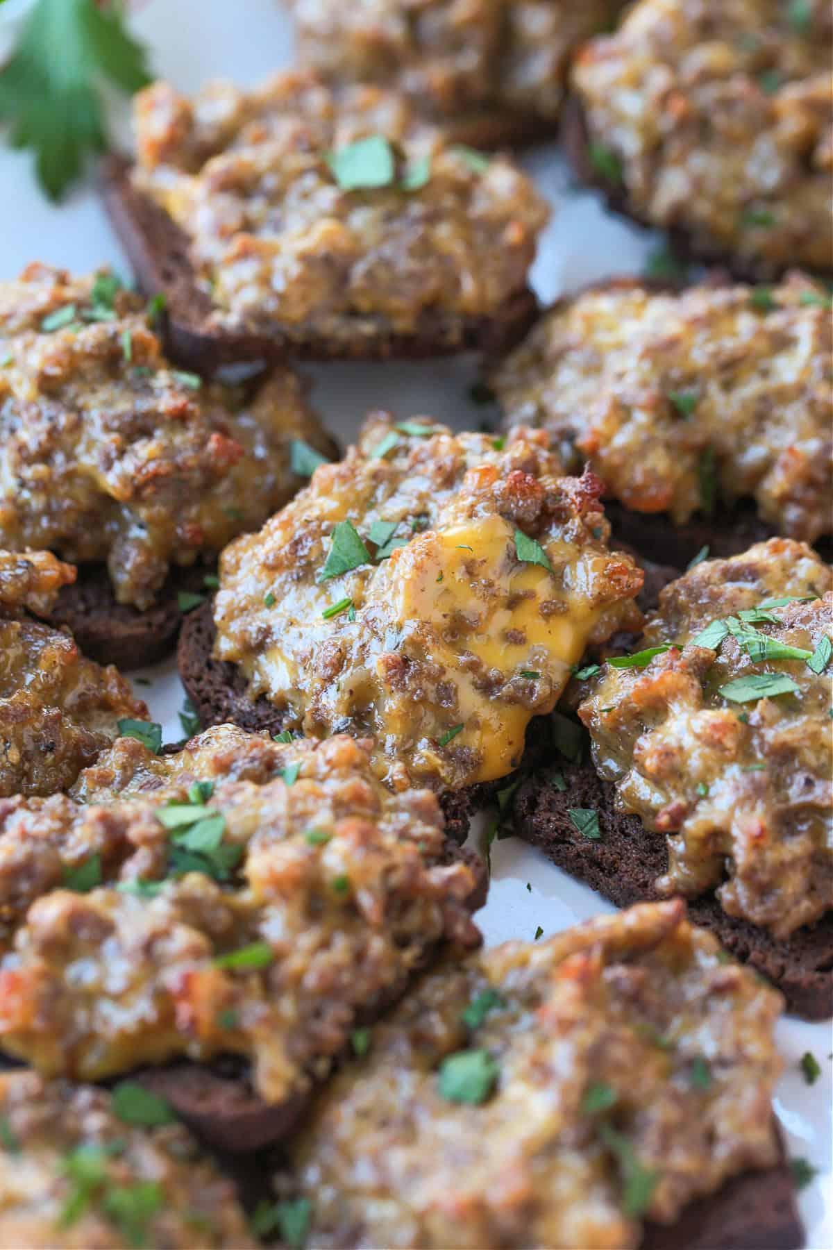 ground beef, sausage and cheese appetizers on cocktail rye