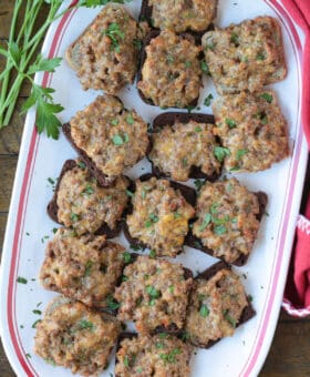 platter of ground beef, sausage and Velveeta appetizers on cocktail rye