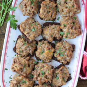 platter of ground beef, sausage and Velveeta appetizers on cocktail rye