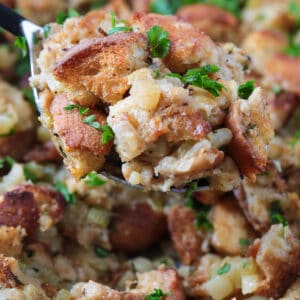 sourdough stuffing on a serving spoon