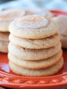 iced meltaway cookies stacked on a plate