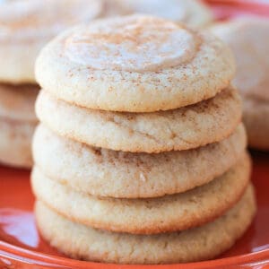iced meltaway cookies stacked on a plate