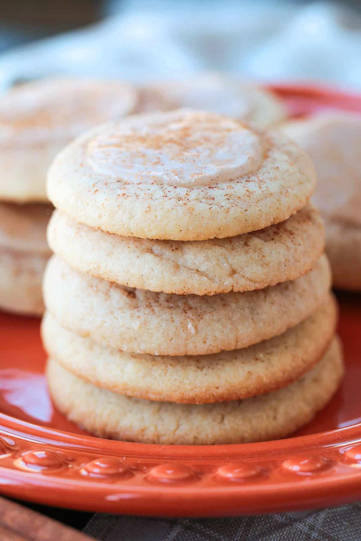 iced meltaway cookies stacked on a plate