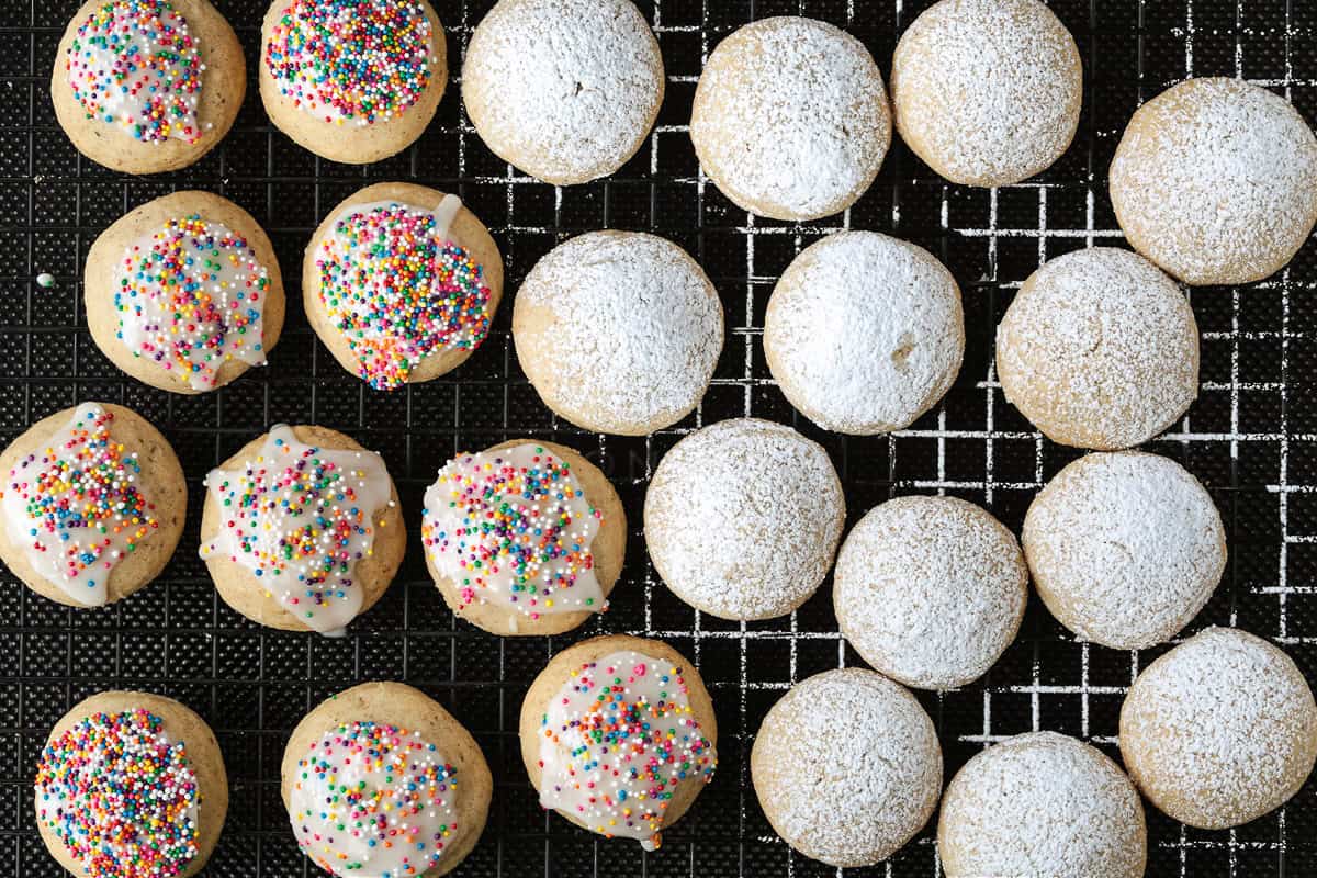 baked and decorated cookies on cooling rack