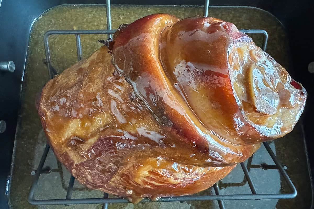 glazed ham in roasting pan