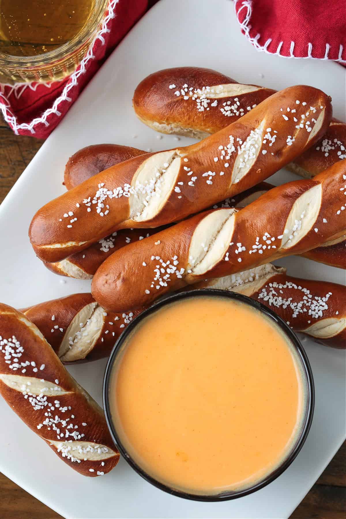 platter with pretzel sticks and beer cheese dip