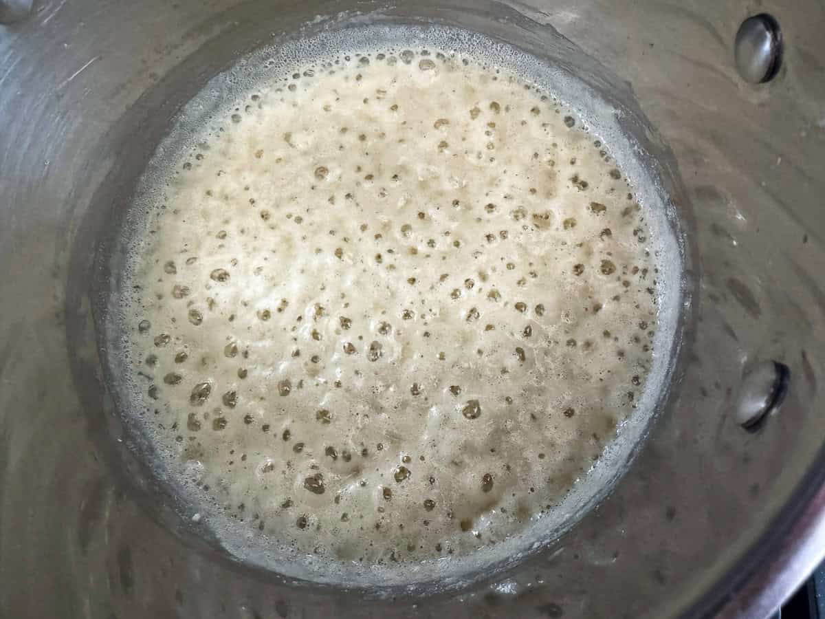 a roux bubbling in a pot