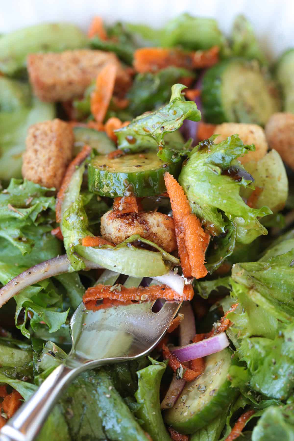 fork with a bite of salad