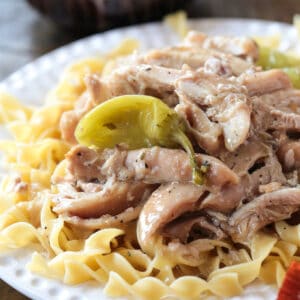 mississippi chicken over egg noodles with pepperoncini peppers