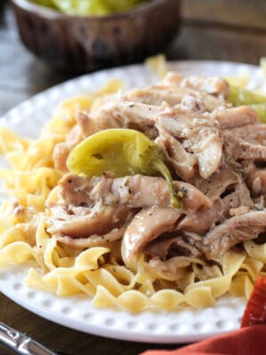 mississippi chicken over egg noodles with pepperoncini peppers