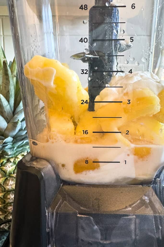 pineapple and yogurt in a blender