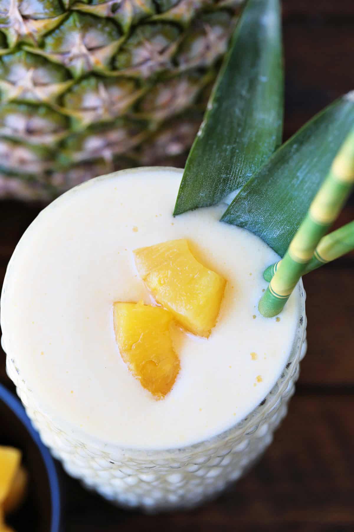 close up of top of smoothie garnished with pineapple