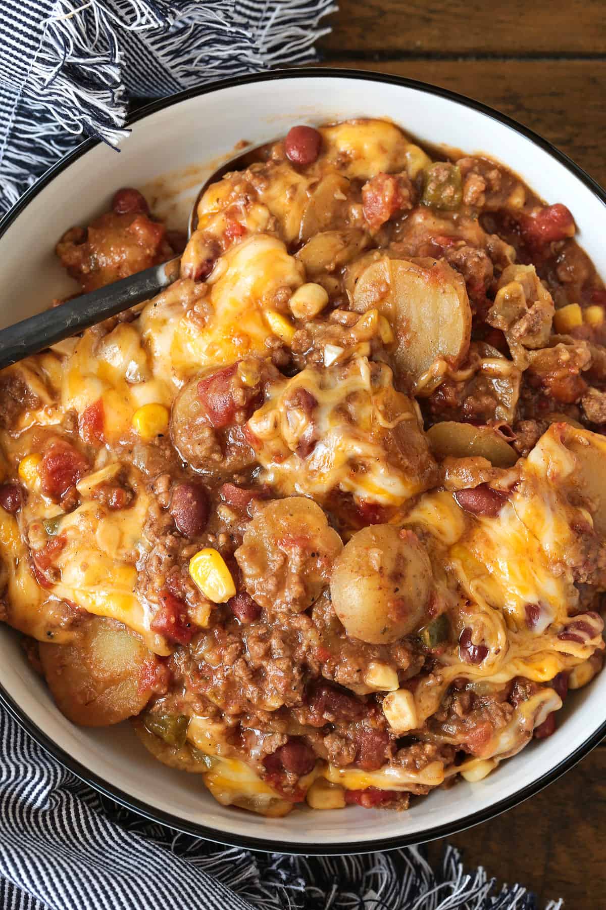 cowboy casserole in a round dish with napkin