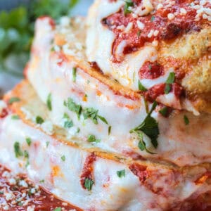 sliced chicken parmesan meatloaf stacked on a plate